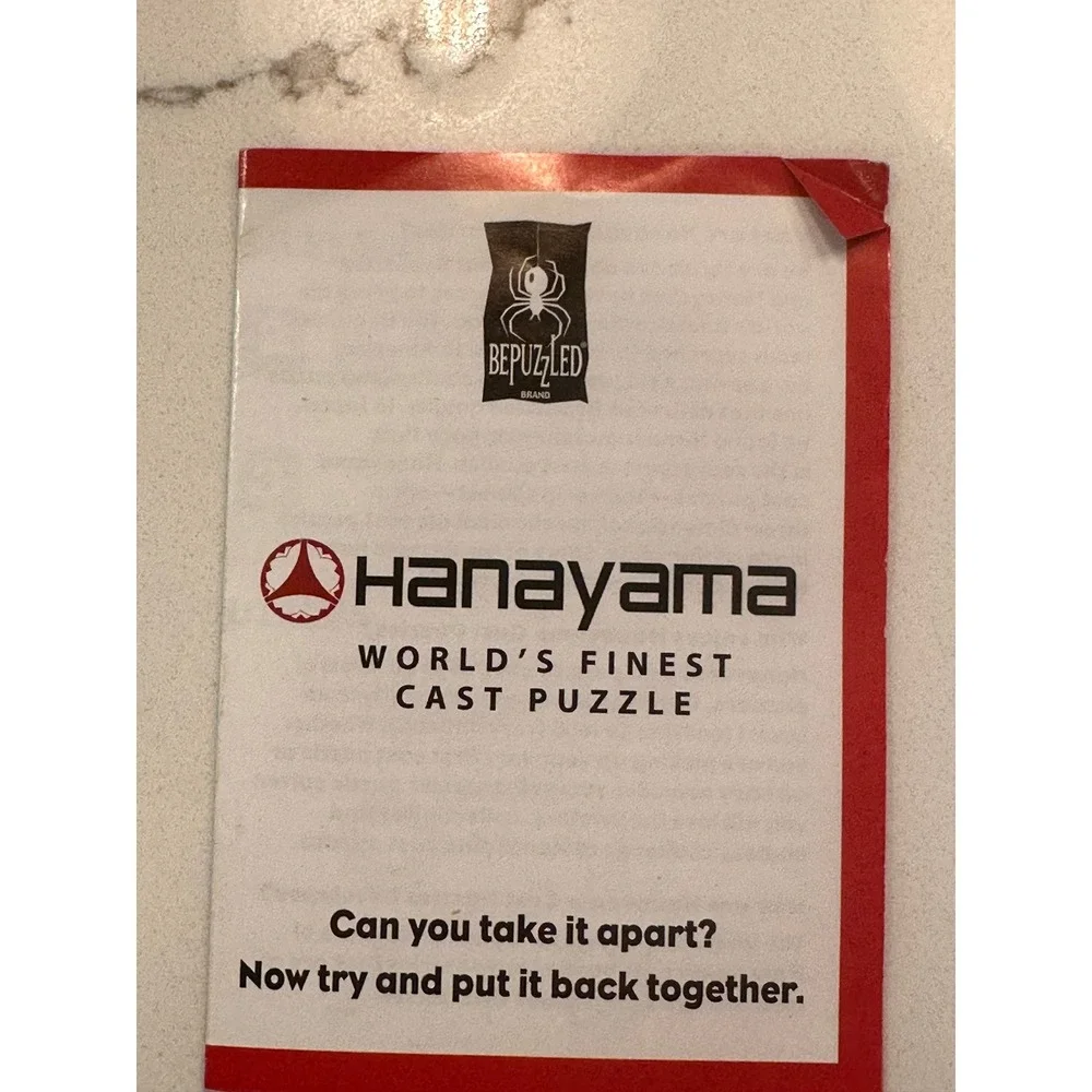 Hanayama Enigma Level 6 Cast Metal Brain Teaser Puzzle BePuzzled 30861